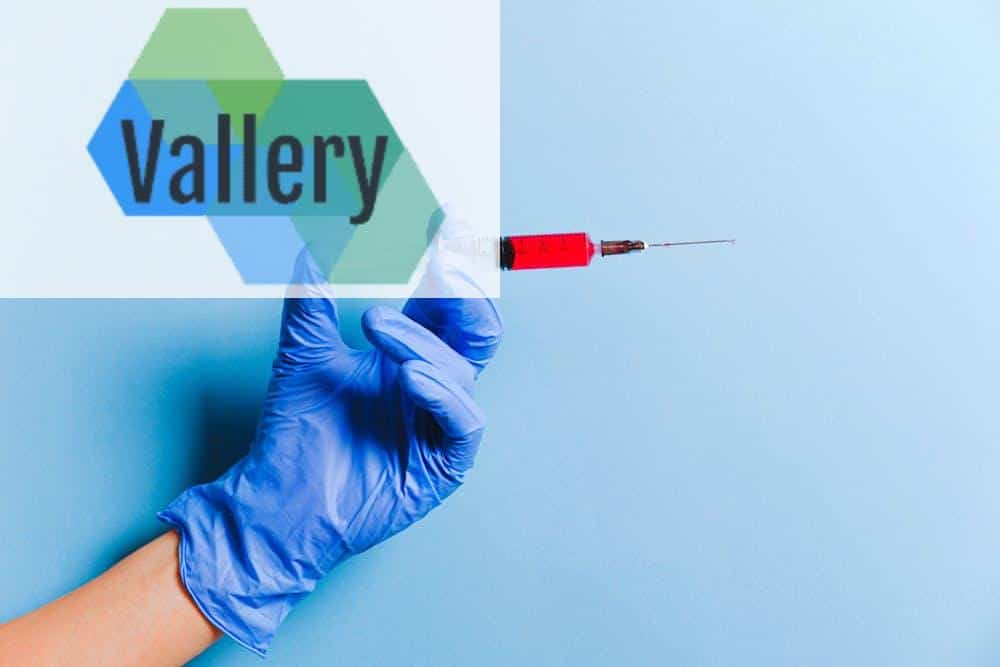 Person Holding Syringe