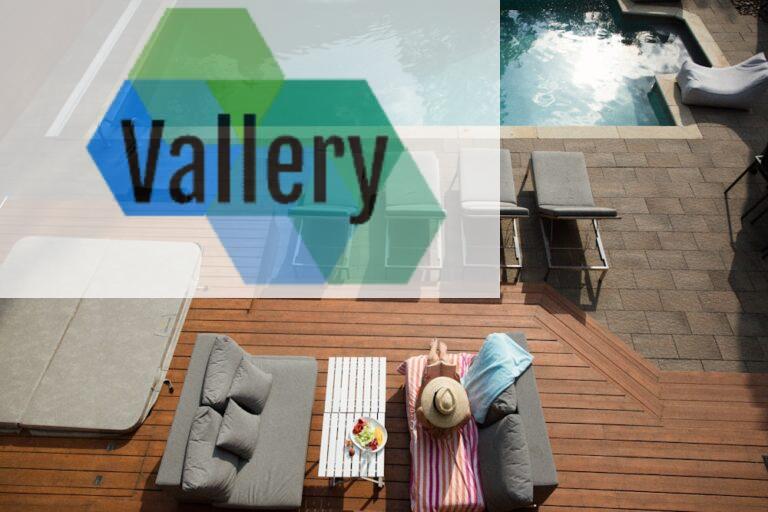 four gray loungers near pool